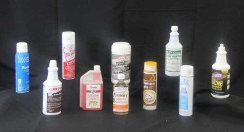 photo of several cleaning agents sold by C&C Suppliers against a black background